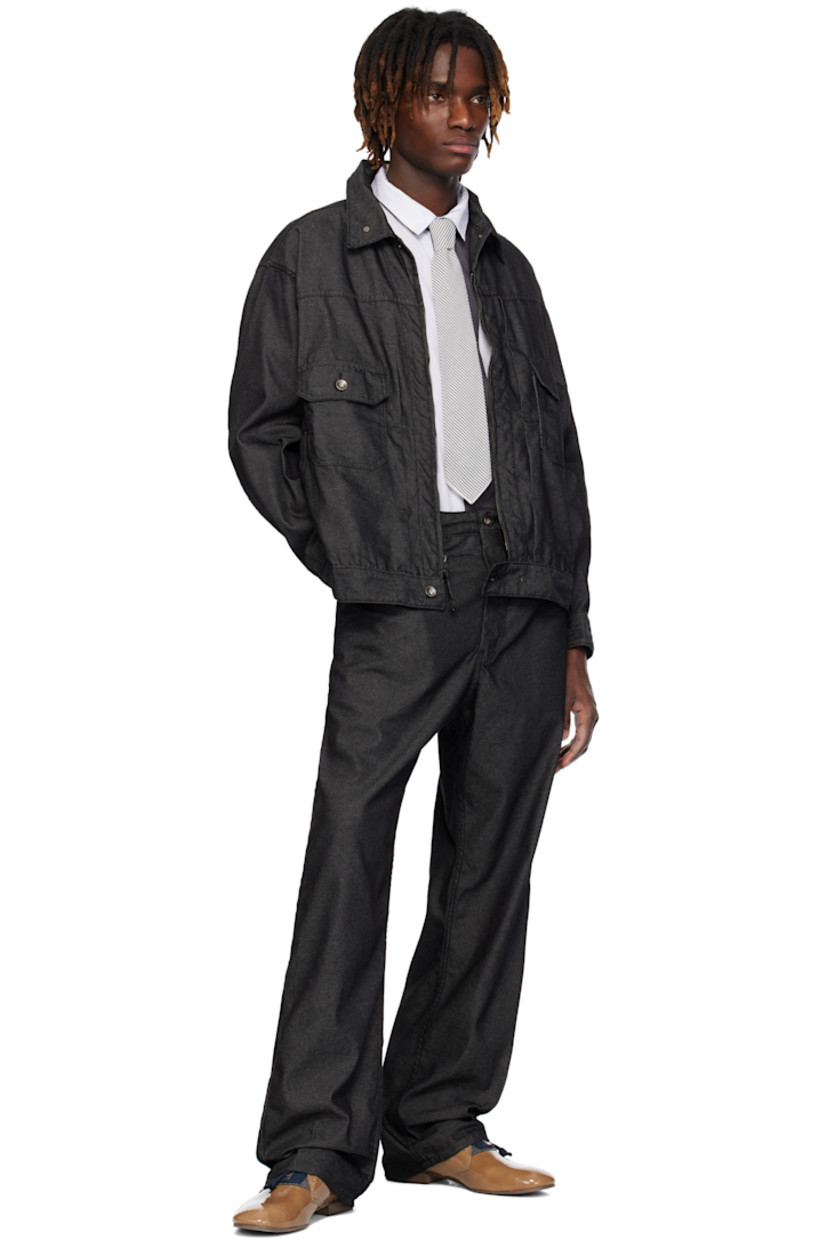 Non-stretch denim jacket. 

· Press-stud hardware at spread collar
· Two-way zip closure
· Flap and welt pockets
· Button fastening at hem
· Single-button barrel cuffs
· Adjustable button tab at back
· Logo-engraved silver-tone hardware

Supplier color: Black