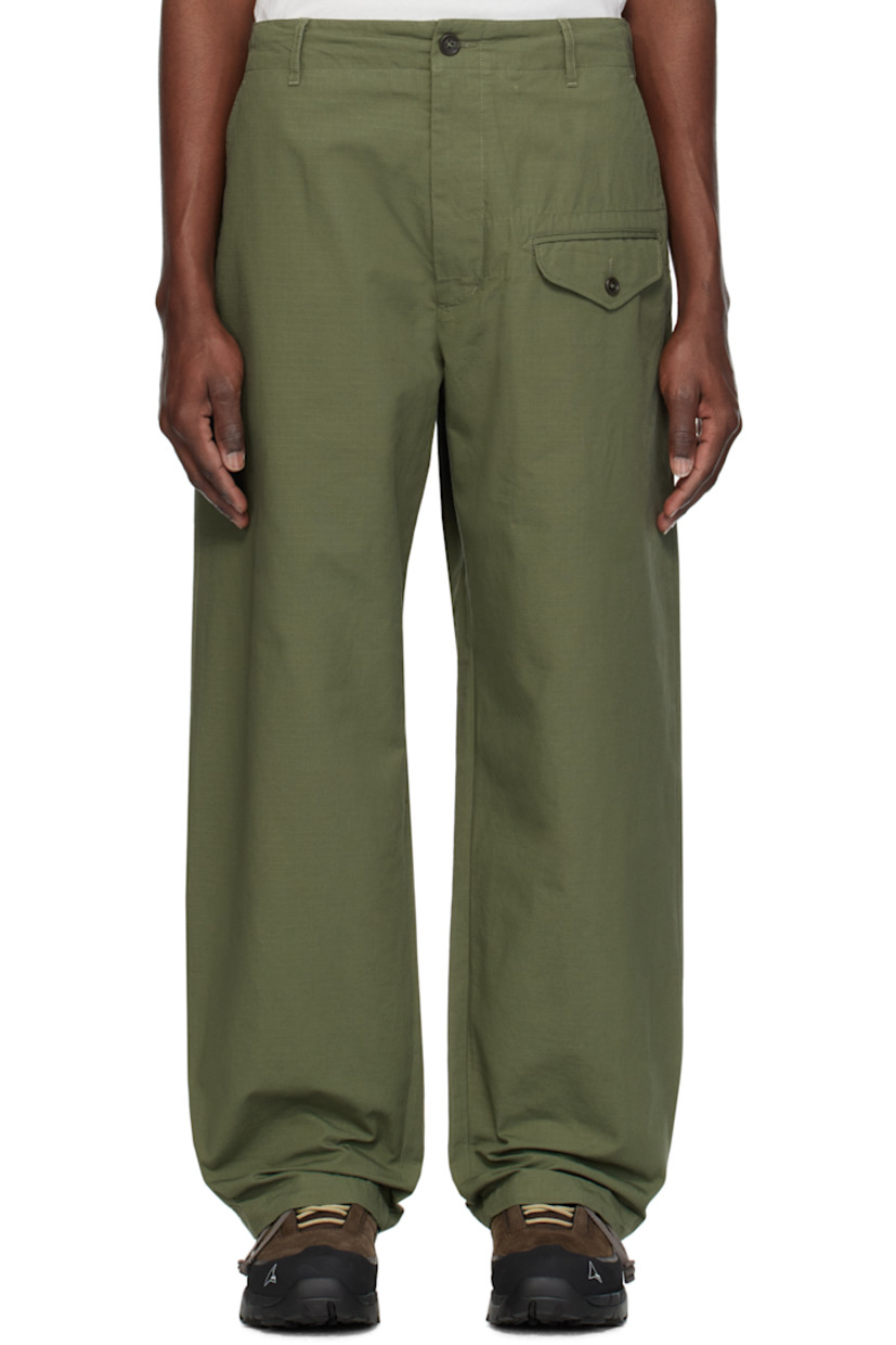Cotton ripstop trousers.

· Belt loops
· Concealed drawstring at waistband
· Four-pocket styling
· Zip-fly
· Flap pocket at front
· Drawstring at cuffs

Supplier color: Olive cotton ripstop