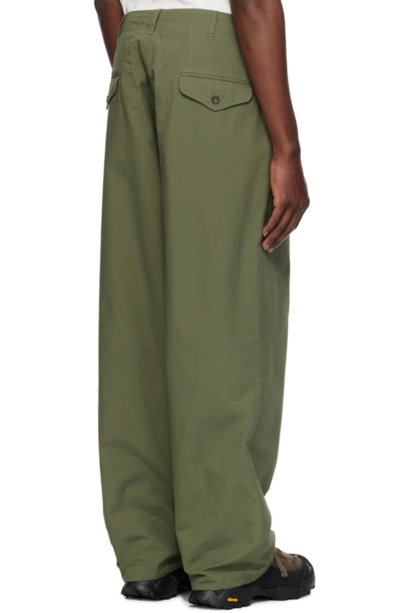 Cotton ripstop trousers.

· Belt loops
· Concealed drawstring at waistband
· Four-pocket styling
· Zip-fly
· Flap pocket at front
· Drawstring at cuffs

Supplier color: Olive cotton ripstop