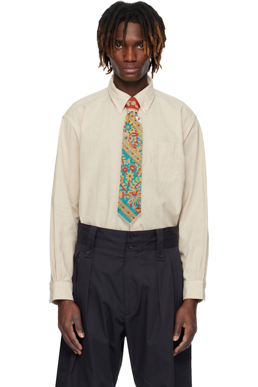 Plain-woven linen- and cotton-blend shirt. 

· Button-down spread collar
· Button closure 
· Patch pocket at chest 
· Shirttail hem 
· Single-button barrel cuffs 
· Box pleat at back yoke 
· Mother-of-pearl hardware

Supplier color: Natural