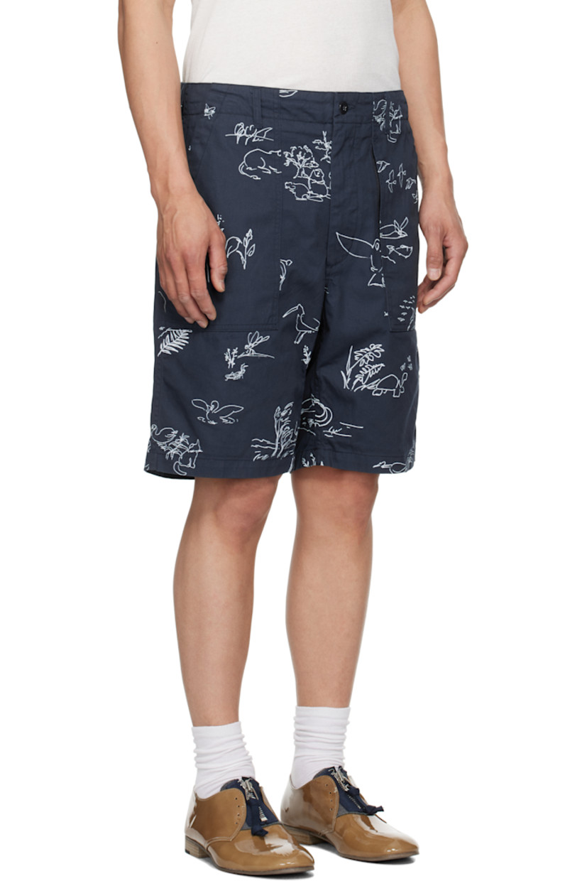 6.5 oz cotton twill shorts. Graphic pattern printed throughout. 

· Belt loops 
· Concealed drawstring at waistband
· Four-pocket styling
· Zip fly

Supplier color: Navy animal print 6.5oz flat twill