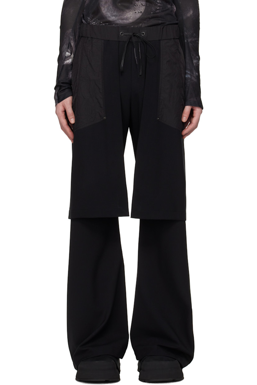 Plain-woven stretch polyester-blend trousers.

· Sheer organza trim at waistband and front
· Drawstring at elasticized waistband
· Two-pocket styling
· Mock fly
· Integrated overlay panels at front
· Press-stud hardware at outseam

Supplier color: Black