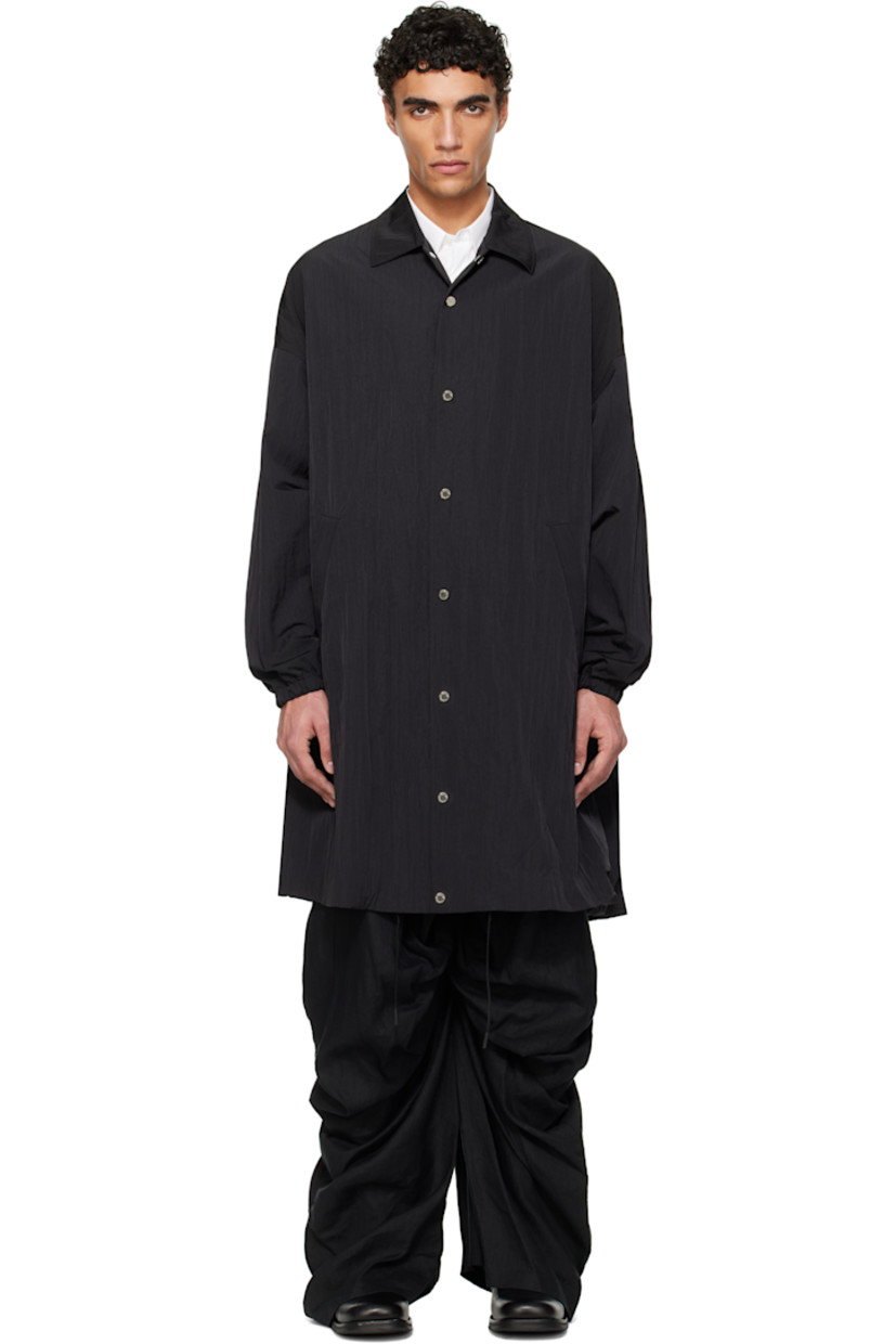 Crinkled nylon taffeta coat.

· Spread collar
· Press-stud closure
· Welt pockets
· Drawstring at hem
· Dropped shoulders
· Dolman sleeves
· Elasticized cuffs
· Zip pocket at interior
· Full ripstop lining

Supplier color: Black