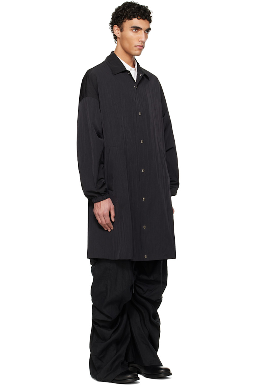 Crinkled nylon taffeta coat.

· Spread collar
· Press-stud closure
· Welt pockets
· Drawstring at hem
· Dropped shoulders
· Dolman sleeves
· Elasticized cuffs
· Zip pocket at interior
· Full ripstop lining

Supplier color: Black