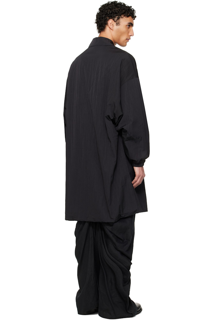 Crinkled nylon taffeta coat.

· Spread collar
· Press-stud closure
· Welt pockets
· Drawstring at hem
· Dropped shoulders
· Dolman sleeves
· Elasticized cuffs
· Zip pocket at interior
· Full ripstop lining

Supplier color: Black