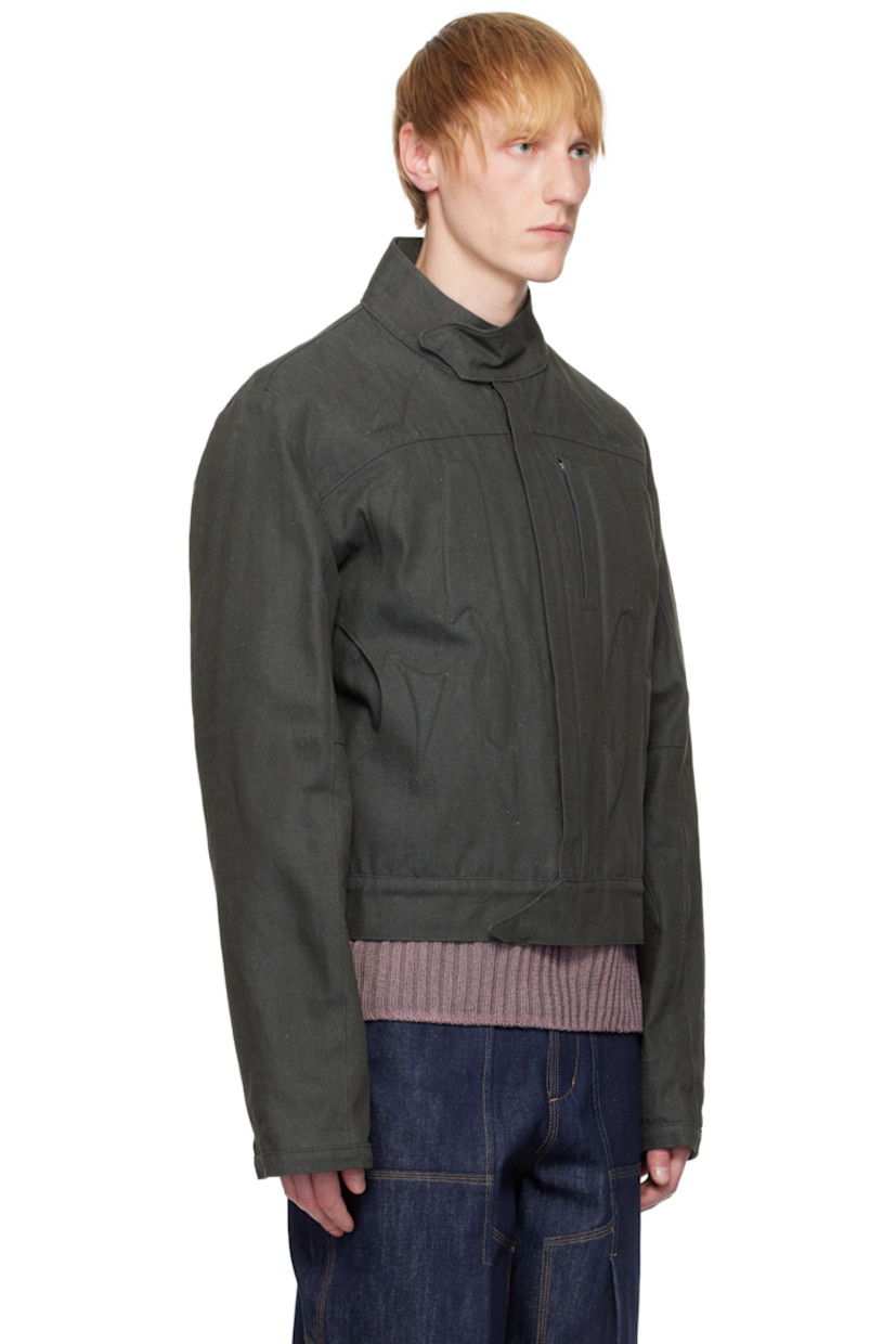 Cotton gabardine jacket. Padded graphic inserts throughout.

· Press-stud tab at stand collar and front hem
· Logo charm at zip closure
· Zip pocket and welt pockets
· Patch pocket at side seams
· Full cotton jersey lining

Supplier color: Grey