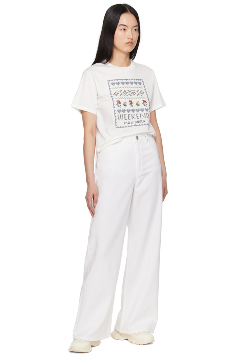 Low-top mesh, calfskin suede, and buffed calfskin sneakers in off-white.

· Lace-up closure
· Logo patch and pull-loop at padded tongue
· Padded collar
· Pull-loop at heel tab
· Logo bonded at heel counter
· Mesh lining
· Treaded rubber sole

Supplier color: Ivory