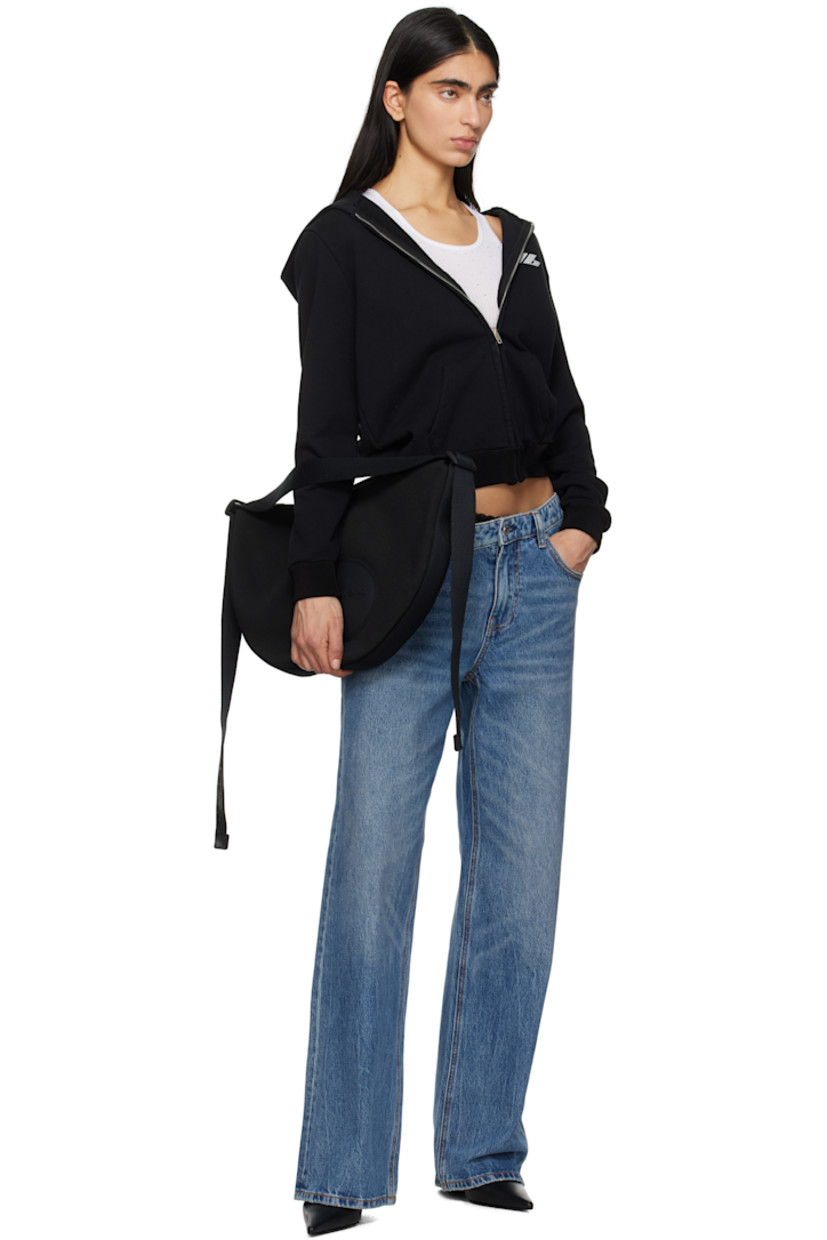 Nylon canvas messenger bag in black. 

· Adjustable webbing crossbody strap
· Rubberized logo patch at face
· Zip closure
· Zip pocket at interior 
· Full twill lining
· H11" x W18.5" x D2"

Supplier color: Black
