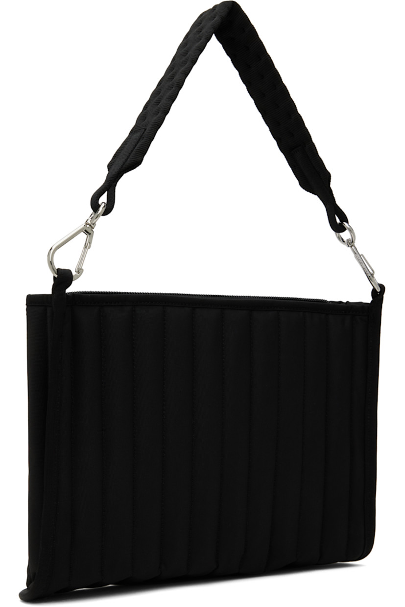 Padded and quilted nylon canvas shoulder bag in black. 

· Detachable shoulder strap
· Logo bonded at face
· Zip closure
· Patch pockets at interior 
· Silver-tone hardware
· H10" x W13.5" x D2.5"

Supplier color: Black