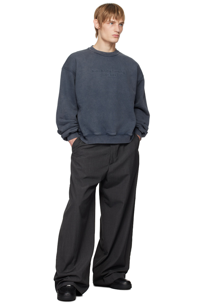 French terry sweatshirt.

· Rib-knit crewneck, hem, and cuffs
· Logo embossed at front
· Dropped shoulders

Supplier color: Acid pebble