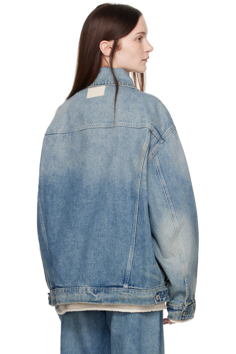 Non-stretch denim jacket. Fading, whiskering, smudging, and subtle distressing throughout.

· Spread collar
· Button closure 
· Tucks at front 
· Flap pocket
· Welt pockets
· Dropped shoulders
· Single-button barrel cuffs
· Patch at back collar
· Button tabs at back hem

Supplier color: Beige wash