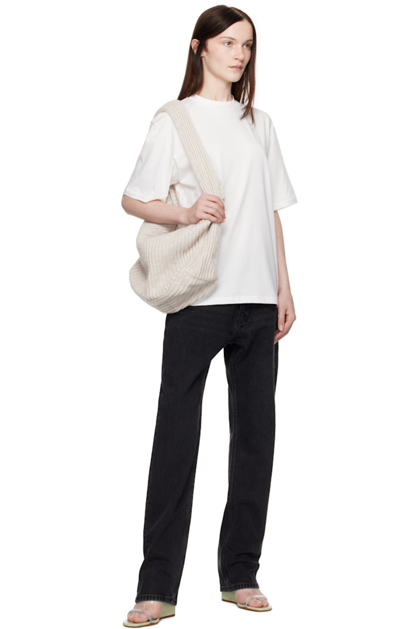 Cotton jersey T-shirt. 

· Crewneck 
· Patch at back collar 

Supplier color: White
