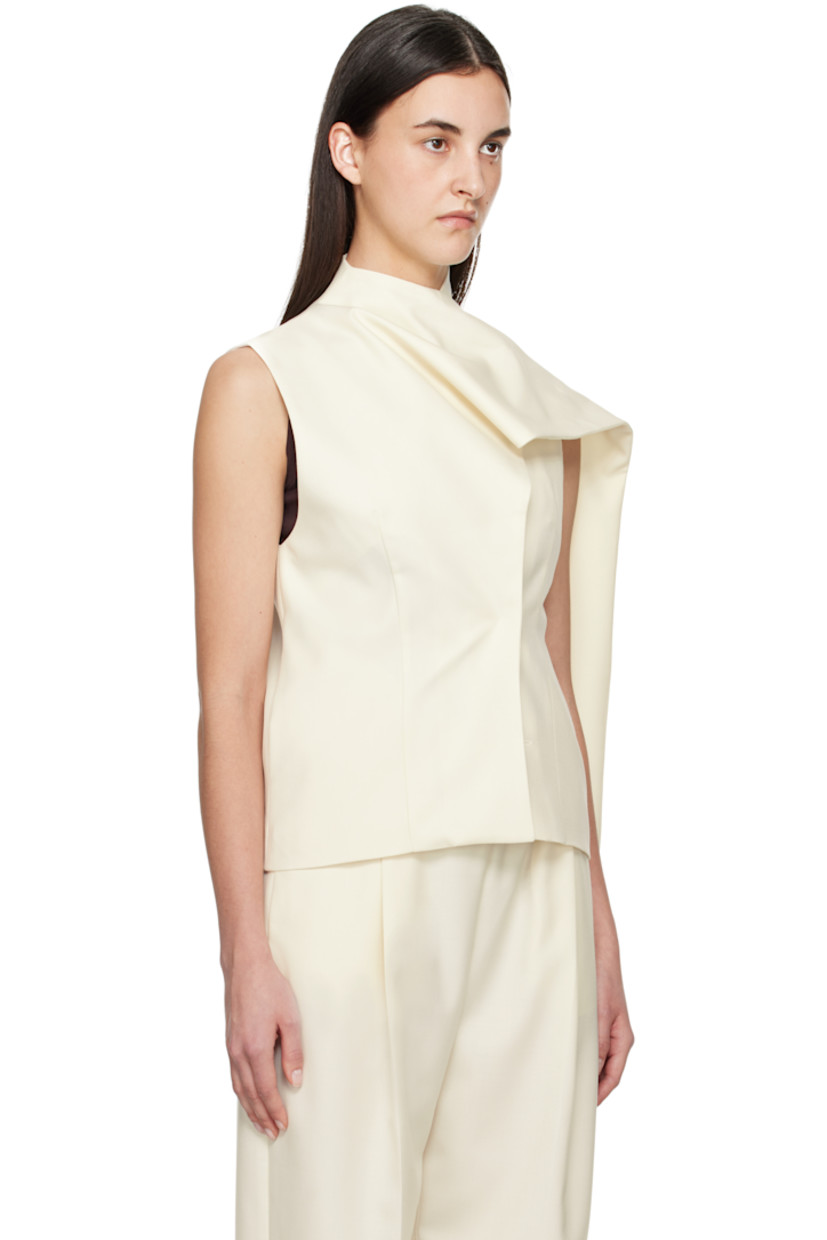 Wool-blend twill top. 

· Wrap construction
· Draped extended trim at funnel neck
· Concealed button closure
· Darts at front and back
· Seam pockets
· Partially lined 

Supplier color: White