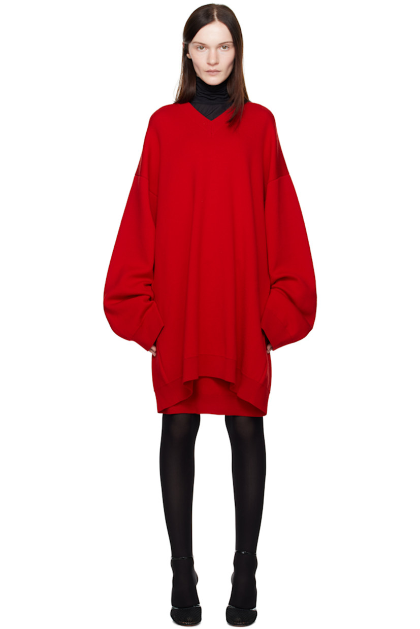 Knit wool minidress.

· Rib-knit V-neck, hem, and cuffs
· Dropped shoulders
· Twin inverted pleats at back

Supplier color: Red