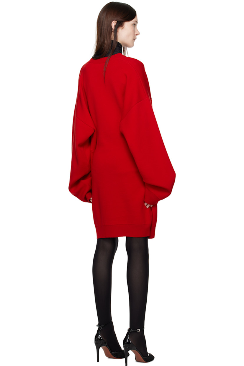 Knit wool minidress.

· Rib-knit V-neck, hem, and cuffs
· Dropped shoulders
· Twin inverted pleats at back

Supplier color: Red
