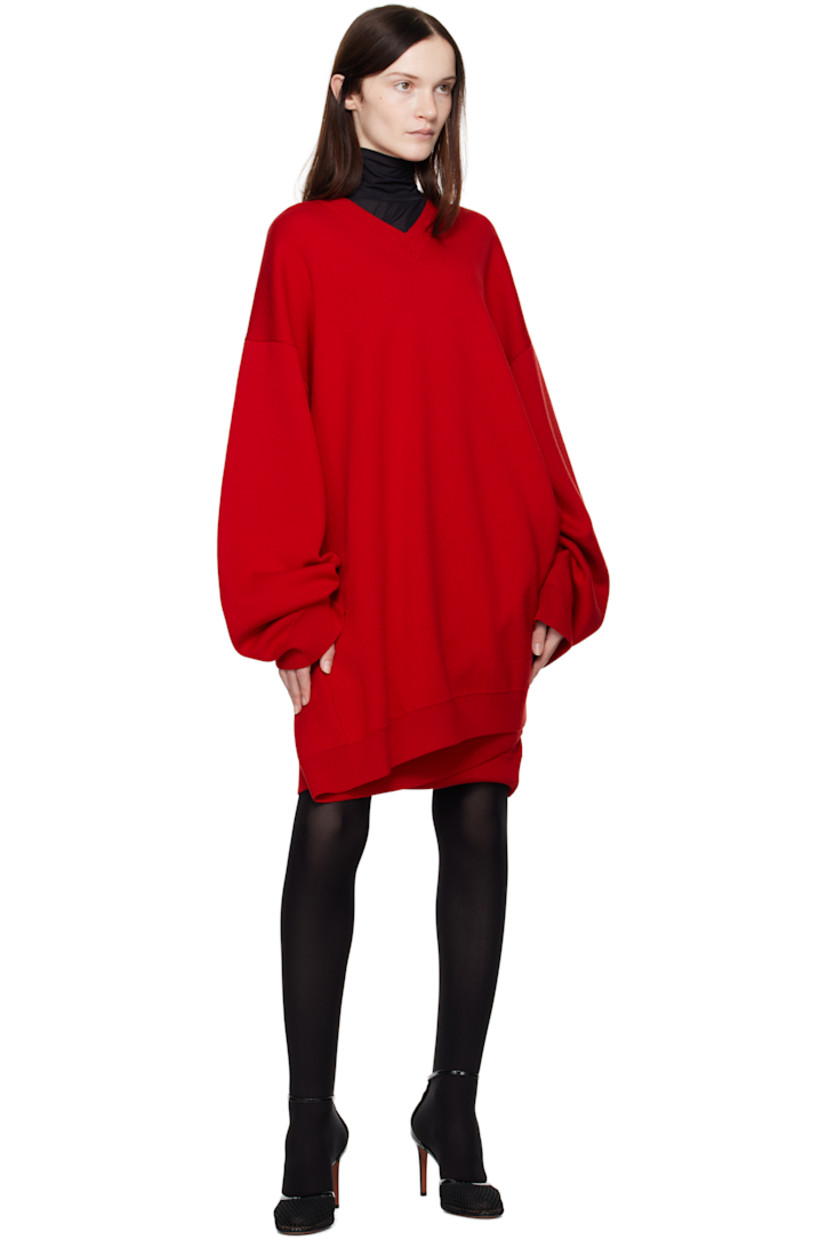 Knit wool minidress.

· Rib-knit V-neck, hem, and cuffs
· Dropped shoulders
· Twin inverted pleats at back

Supplier color: Red