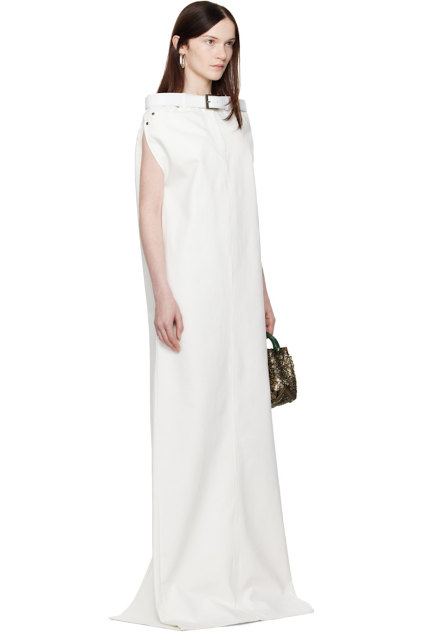 Non-stretch denim maxi dress.

· Belt loops at straight neck
· Detachable pin-buckle belt
· Five-pocket styling
· Zip-fly
· Central vent at back hem
· Raw edge at hem
· Unlined

Supplier color: Ivory