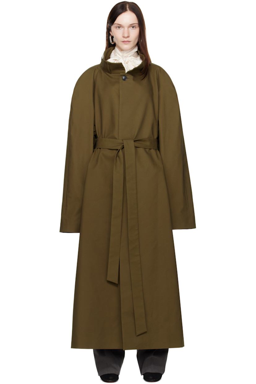 Cotton ripstop trench coat.

· Belt loops at funnel neck and waist
· Detachable self-tie belt at waist
· Concealed button closure
· Welt pockets
· Storm flap at back
· Central vent at back hem
· Welt pocket at interior
· Full cupro satin lining

Supplier color: Khaki