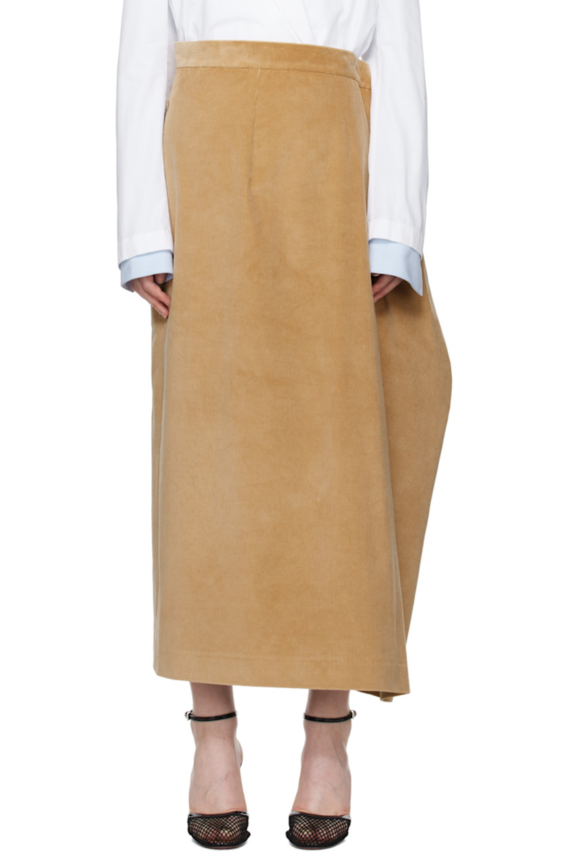 Stretch cotton corduroy midi skirt.

· Button fastenings at waistband
· Darts at front and back waist
· Two-pocket styling
· Central vent at back hem 
· Full satin lining

Supplier color: Beige