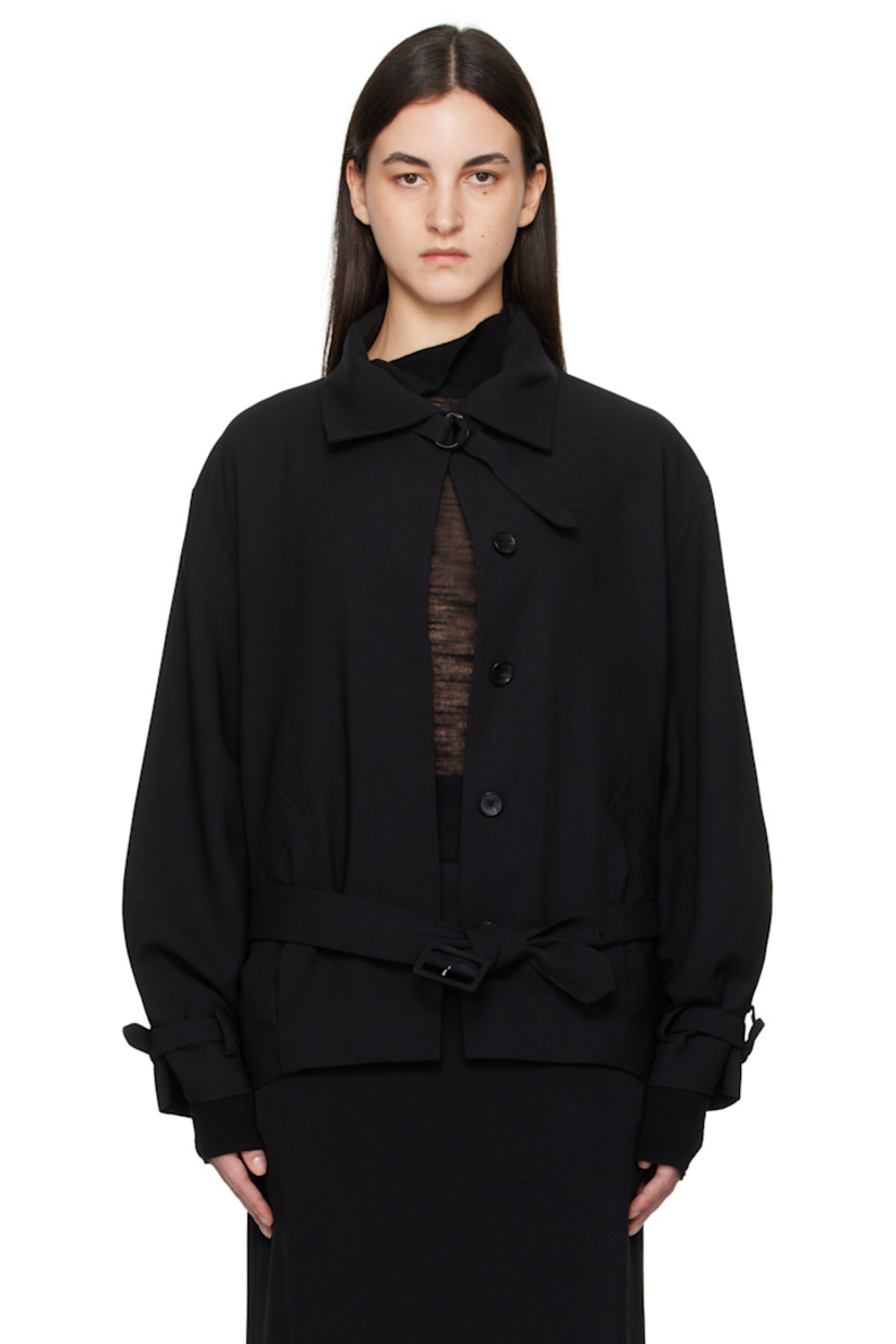 Virgin wool twill jacket. 

· Detachable cinch fastening at spread collar
· Concealed button closure
· Belt loops and detachable pin-buckle belt
· Welt pockets
· Tucks at front hem
· Adjustable cinch tab at cuffs
· Welt pockets at interior
· Full silk satin lining

Supplier color: Black