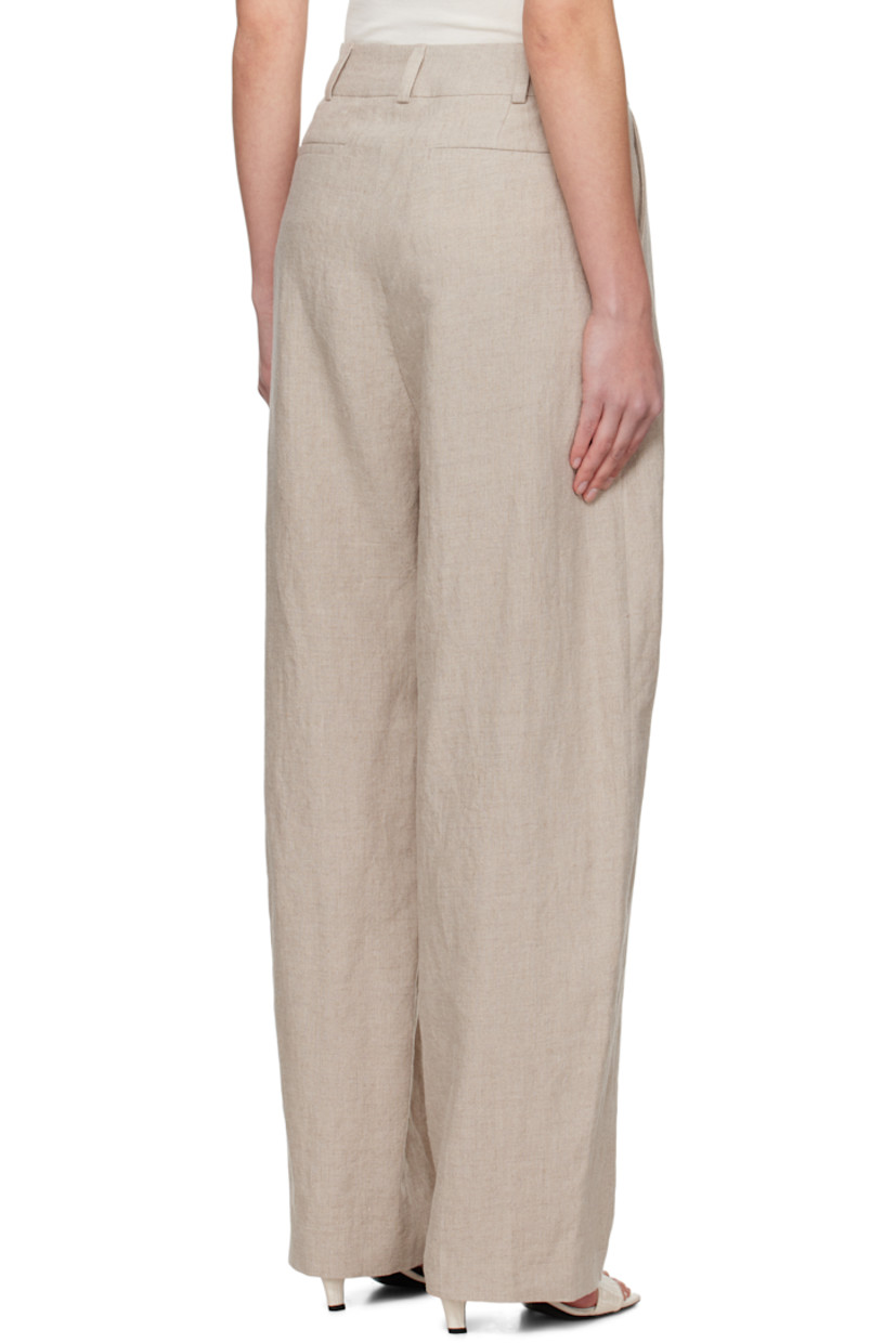 Basket-woven linen trousers. 

· Mid-rise
· Belt loops
· Four-pocket styling
· Zip fly
· Pleats at front
· Dropped inseam

Supplier color: Beige