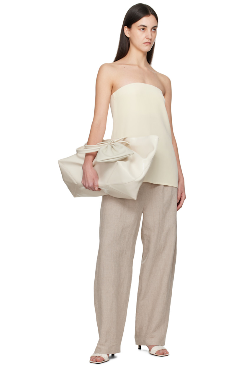 Basket-woven linen trousers. 

· Mid-rise
· Belt loops
· Four-pocket styling
· Zip fly
· Pleats at front
· Dropped inseam

Supplier color: Beige