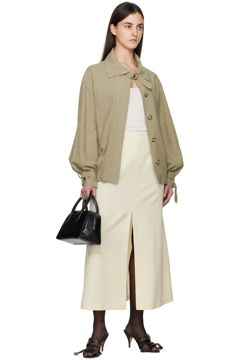 Stretch virgin wool- and cashmere-blend twill midi skirt.

· Darts at waistband
· Vent at front and back hem 
· Zip closure at side seam
· Unlined

Supplier color: Off white