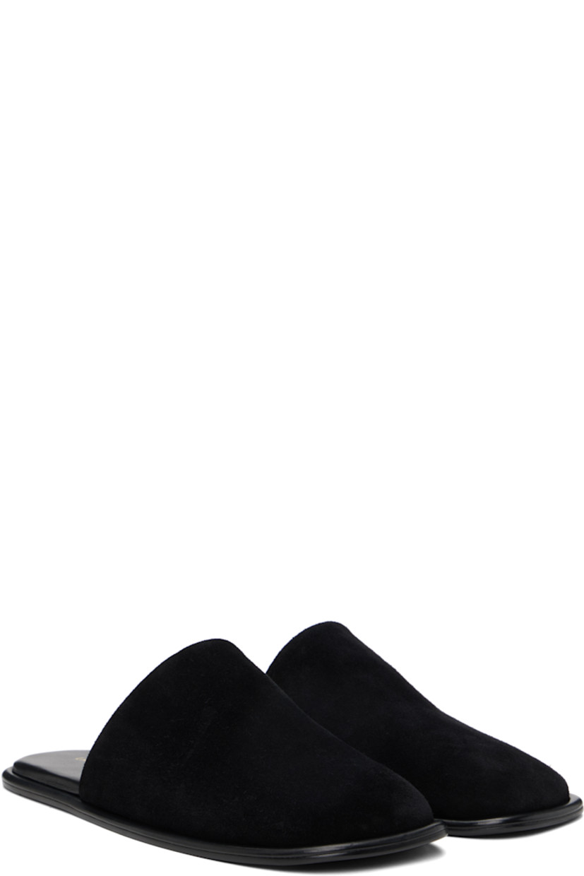 Suede slippers in black.

· Square toe
· Logo stamp at padded footbed
· Leather sole with rubber injections

Supplier color: Black