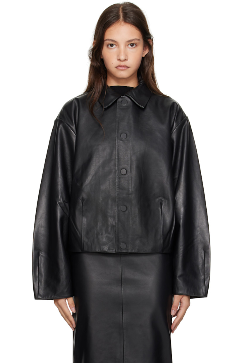 Vegetable-dyed buffed lambskin jacket.

· LWG-certified leather
· Spread collar
· Concealed magnetic button closure
· Darts at front, sleeves, and back
· Seam pockets
· Full TENCEL™ lyocell twill lining

Supplier color: Black
