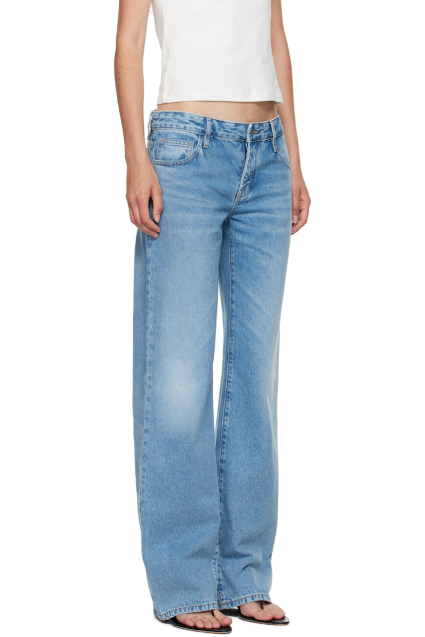 Non-stretch organic cotton denim jeans. 

· OCS- and B Corp-certified 
· Fading, whiskering, and subtle distressing throughout 
· Wide-leg
· Mid-rise 
· Belt loops
· Five-pocket styling
· Concealed button-fly
· Leather logo patch at back waistband
· Logo-engraved silver-tone hardware
· Contrast stitching in tan 

Part of the St. Agni x Outland Denim collaboration.

Supplier color: 90s blue