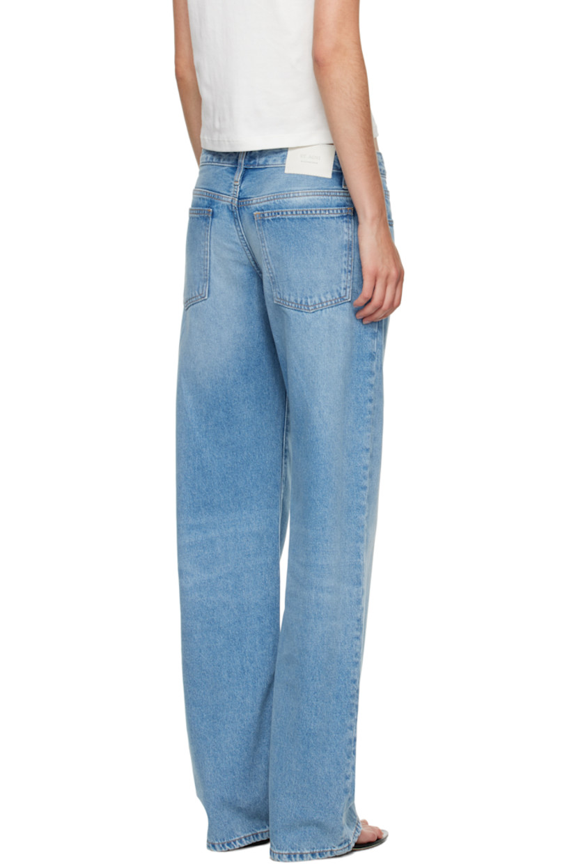Non-stretch organic cotton denim jeans. 

· OCS- and B Corp-certified 
· Fading, whiskering, and subtle distressing throughout 
· Wide-leg
· Mid-rise 
· Belt loops
· Five-pocket styling
· Concealed button-fly
· Leather logo patch at back waistband
· Logo-engraved silver-tone hardware
· Contrast stitching in tan 

Part of the St. Agni x Outland Denim collaboration.

Supplier color: 90s blue
