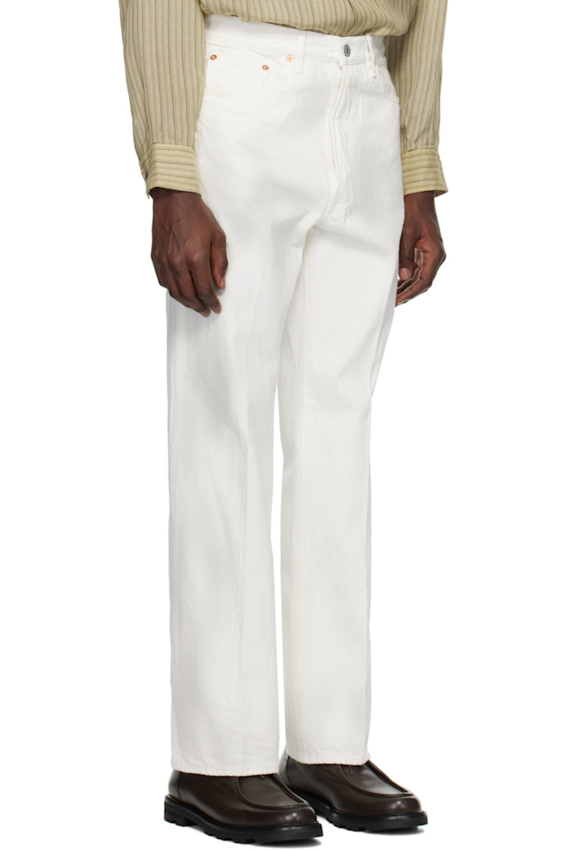 Straight-leg 13.5 oz non-stretch selvedge denim jeans. 

· Belt loops
· Five-pocket styling
· Zip fly
· Creased legs
· Logo-engraved silver- and copper-tone hardware

Supplier color: White one wash