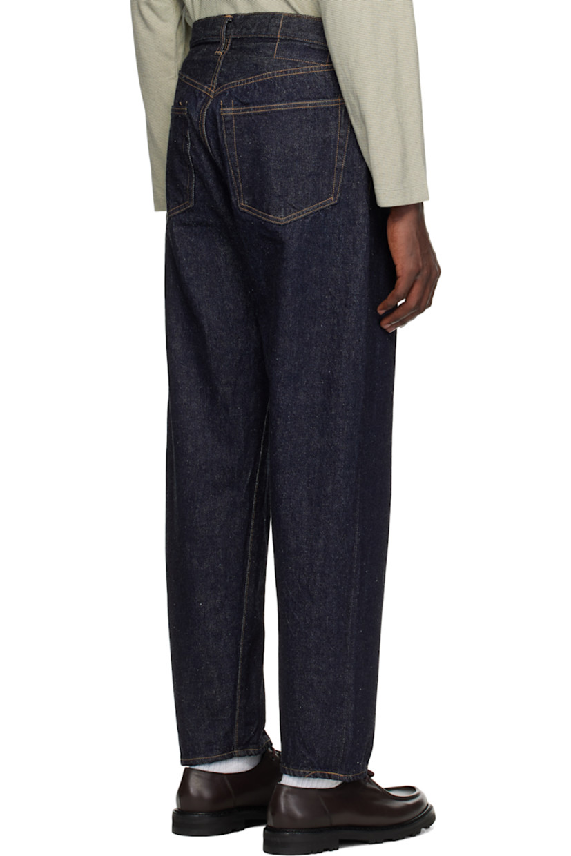 Wide-leg and tapered 13.5 oz non-stretch nep selvedge denim jeans.

· Indigo-dyed
· Belt loops
· Five-pocket styling
· Zip fly
· Logo-engraved silver- and copper-tone hardware
· Contrast stitching in tan

Supplier color: Indigo one wash