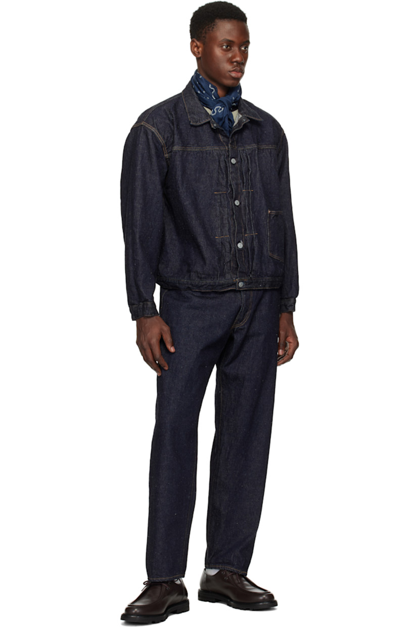 Wide-leg and tapered 13.5 oz non-stretch nep selvedge denim jeans.

· Indigo-dyed
· Belt loops
· Five-pocket styling
· Zip fly
· Logo-engraved silver- and copper-tone hardware
· Contrast stitching in tan

Supplier color: Indigo one wash