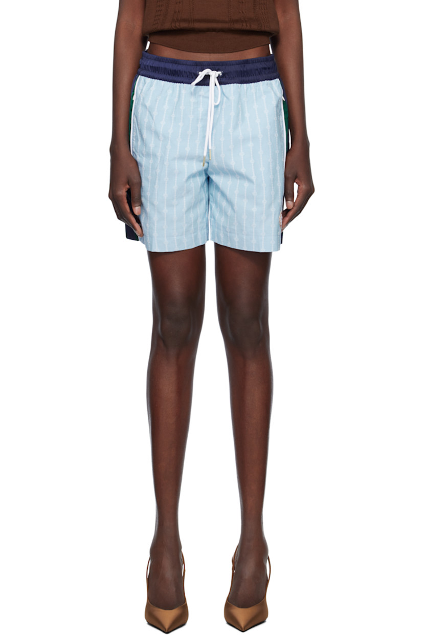 Cotton-blend canvas shorts. Jacquard logo graphic pattern and satin trim throughout.

· Paneled construction
· Drawstring at elasticized waistband
· Three-pocket styling
· Embroidered logo patch at front
· Stripes at outseams
· Full recycled polyester mesh lining
· Gold-tone hardware

Supplier color: Blue