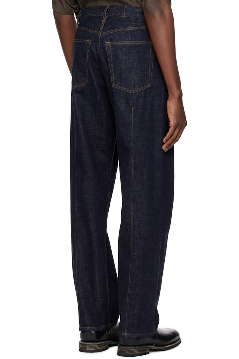 Wide straight-leg non-stretch denim jeans.

· Belt loops
· Five-pocket styling
· Zip fly
· Darts at back legs
· Logo-engraved silver-tone hardware
· Contrast stitching in tan

Supplier color: Indigo