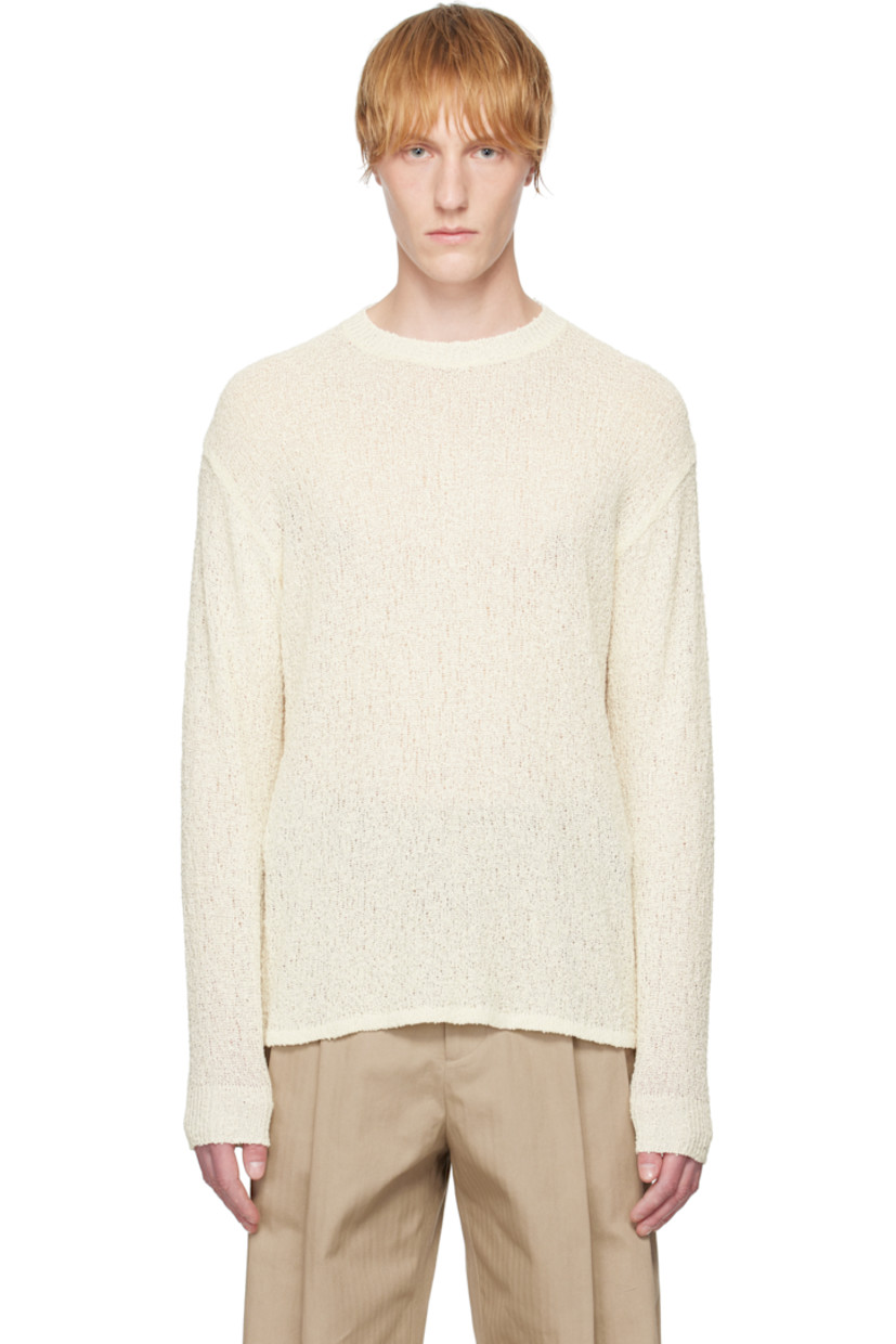 Open-knit cotton sweater. 

· Rib-knit crewneck, hem, and cuffs
· Dropped shoulders
· Rib-knit trim at shoulder seams 

Supplier color: Off-white