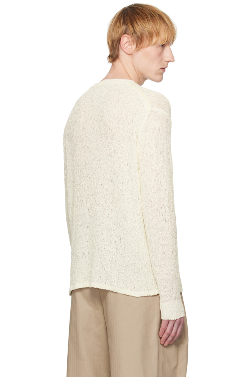 Open-knit cotton sweater. 

· Rib-knit crewneck, hem, and cuffs
· Dropped shoulders
· Rib-knit trim at shoulder seams 

Supplier color: Off-white