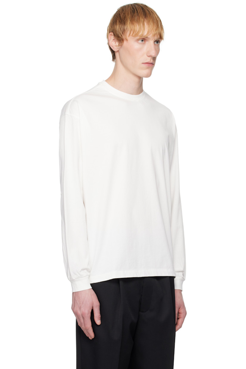36-gauge recycled organic cotton jersey T-shirt.

· Rib-knit crewneck and cuffs
· Dropped shoulders

Supplier color: White