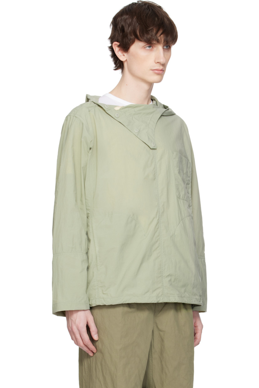 Nylon taffeta jacket. 

· Bungee-style drawstring at hood and hem
· Button fastening at funnel neck extends to shoulder
· Patch pocket and welt pockets
· Concealed elasticized cuffs
· Unlined 

Supplier color: Olive