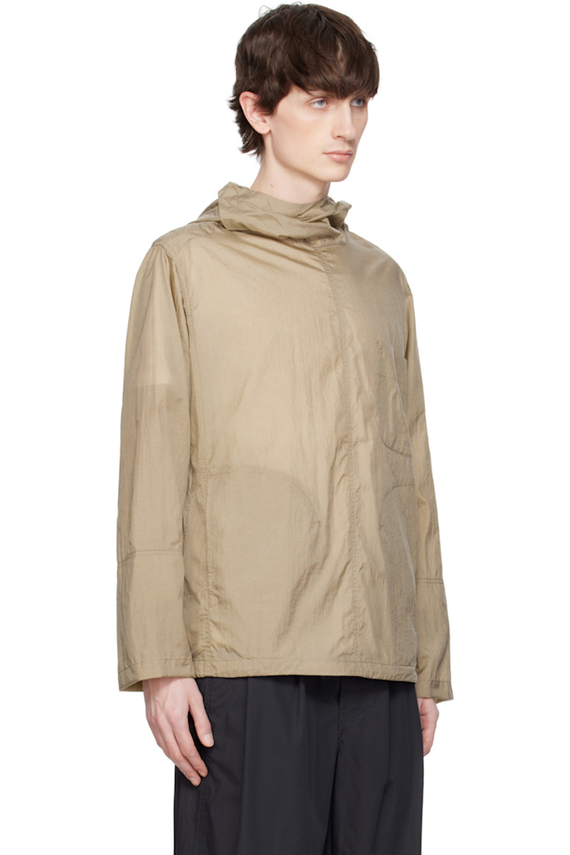 Nylon taffeta jacket. 

· Bungee-style drawstring at hood and hem
· Button fastening at funnel neck extends to shoulder
· Patch pocket and welt pockets
· Concealed elasticized cuffs
· Unlined 

Supplier color: Khaki