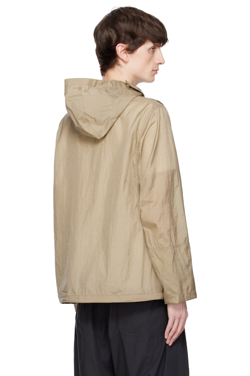 Nylon taffeta jacket. 

· Bungee-style drawstring at hood and hem
· Button fastening at funnel neck extends to shoulder
· Patch pocket and welt pockets
· Concealed elasticized cuffs
· Unlined 

Supplier color: Khaki