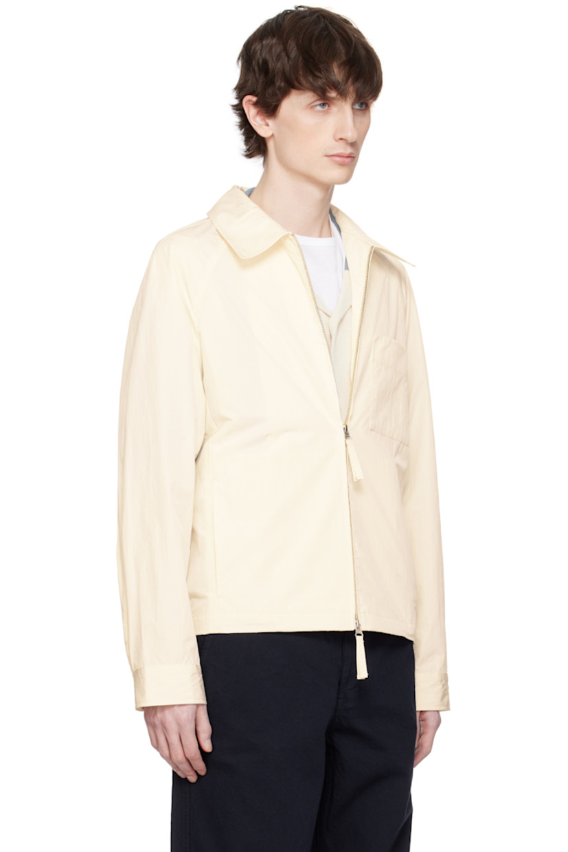 Water-repellent coated cotton- and nylon-blend taffeta jacket. 

· Spread collar
· Two-way zip closure
· Patch pocket and seam pockets
· Partially elasticized hem
· Raglan sleeves
· Press-stud barrel cuffs
· Twin pleats at back yoke
· Patch pockets at interior
· Unlined

Supplier color: Ivory