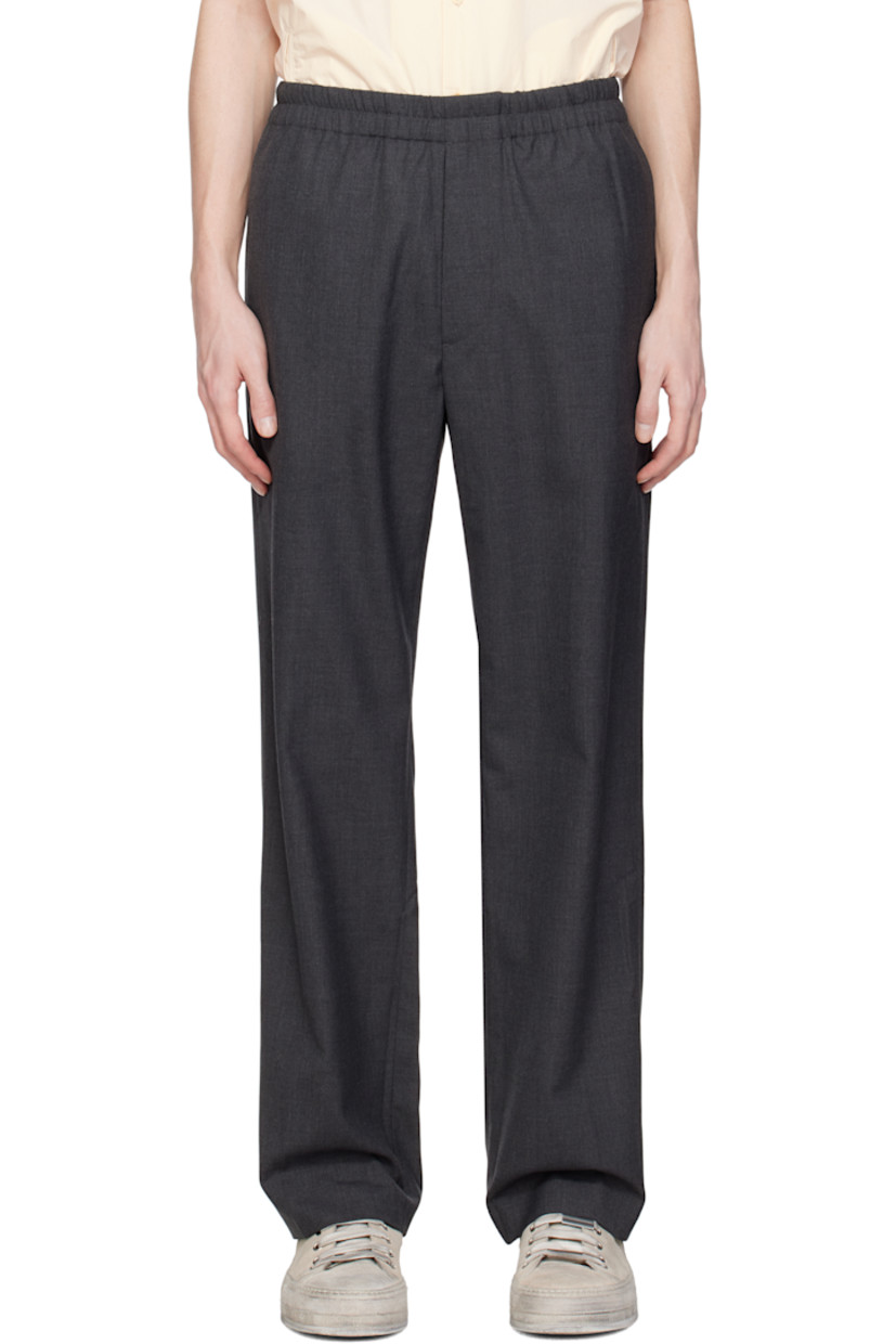 Plain-woven wool- and polyester-blend trousers. 

· Concealed drawstring at elasticized waistband
· Four-pocket styling
· Button fly
· Creased legs
· Logo patch at back waistband 

Supplier color: Grey