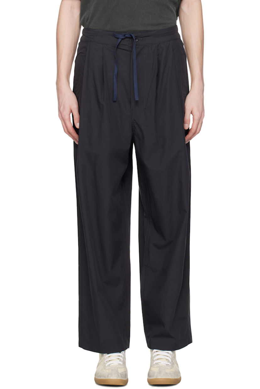 Wide-leg cotton poplin trousers. 

· Drawstring at elasticized waistband 
· Four-pocket styling
· Button fly
· Pleats at front waistband
· Logo patch at back waistband
· Horn hardware

Supplier color: Charcoal