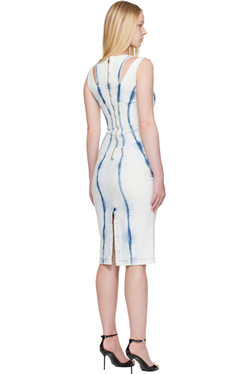 Non-stretch denim minidress.

· Whiskering and fading throughout
· Round neck
· Adjustable pin-buckle shoulder straps
· Zip closure at back
· Vented back hem
· Contrast stitching in tan
· Logo-engraved antiqued gold-tone hardware

Supplier color: Indigo
