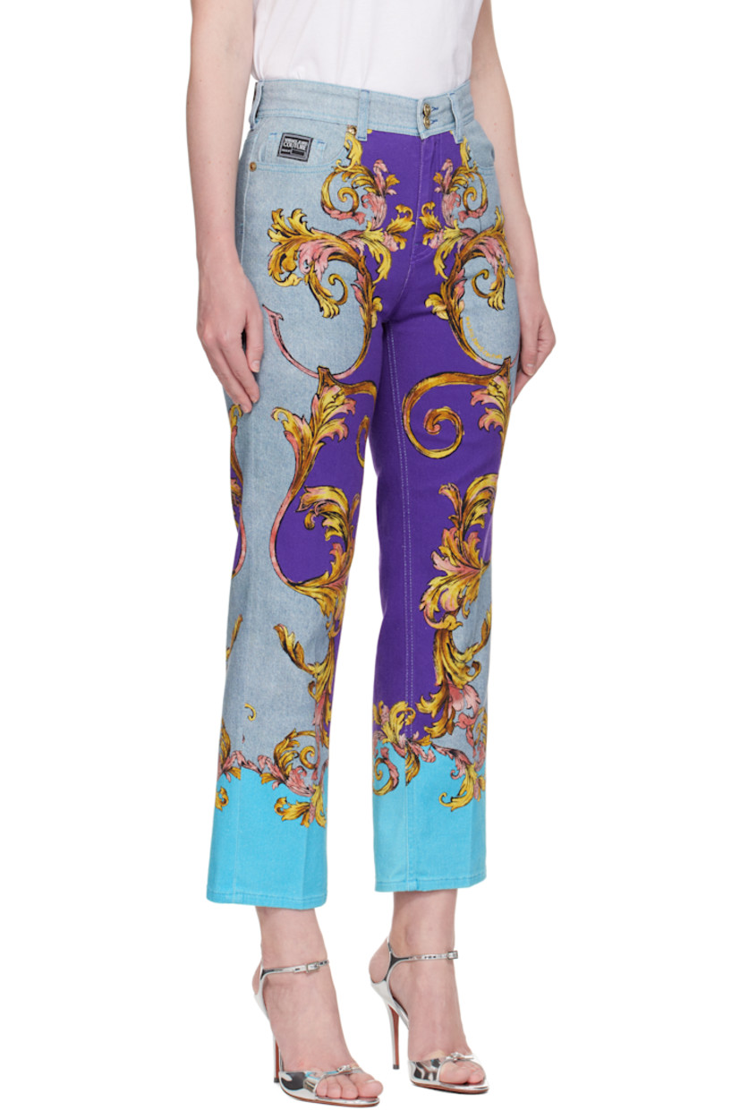Slim-fit stretch denim jeans.

· Graphic printed throughout
· Belt loops
· Five-pocket styling
· Zip fly
· Logo patch at back waistband
· Logo-engraved gold-tone hardware

Supplier color: Print