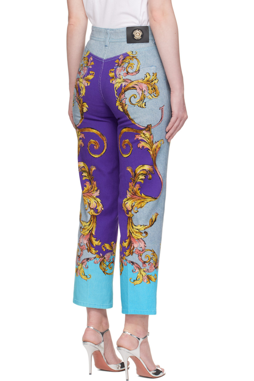 Slim-fit stretch denim jeans.

· Graphic printed throughout
· Belt loops
· Five-pocket styling
· Zip fly
· Logo patch at back waistband
· Logo-engraved gold-tone hardware

Supplier color: Print