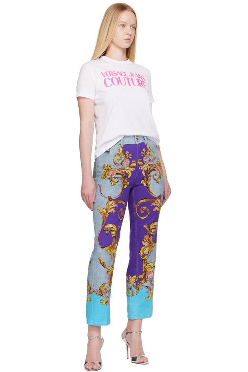 Slim-fit stretch denim jeans.

· Graphic printed throughout
· Belt loops
· Five-pocket styling
· Zip fly
· Logo patch at back waistband
· Logo-engraved gold-tone hardware

Supplier color: Print