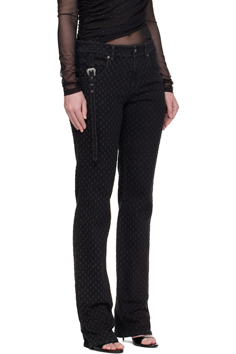 Non-stretch cotton-blend twill jeans.

· Distressed pattern throughout
· Straight leg
· Mid-rise
· Belt loops
· Pin-buckle strap with logo hardware at waist
· Zip fly
· Five-pocket styling
· Leather logo patch at back waistband

Supplier color: Black